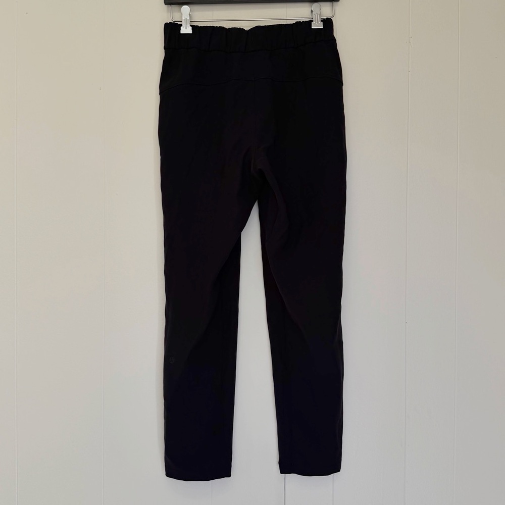 LULULEMON On the Fly 7/8 Pant Woven Black Size 4 LW5BPMS - Picture 5 of 10